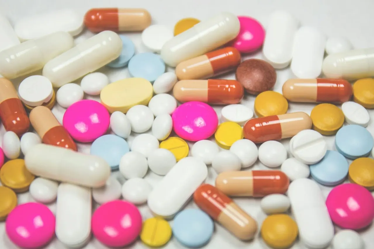 Supplement capsules in production